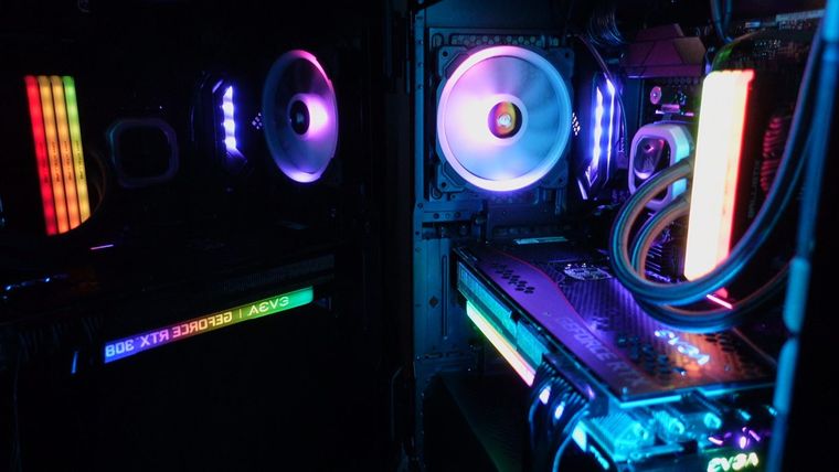 Interior of a custom-built computer with lit cooling fans