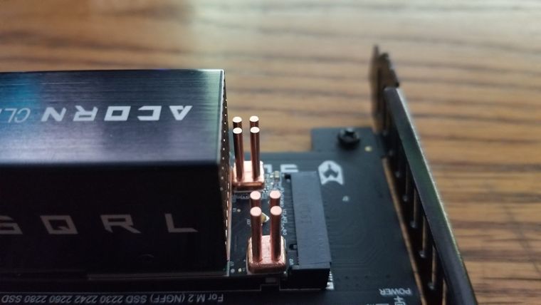 M.2 NVMe solid state drive with heatsink being installed